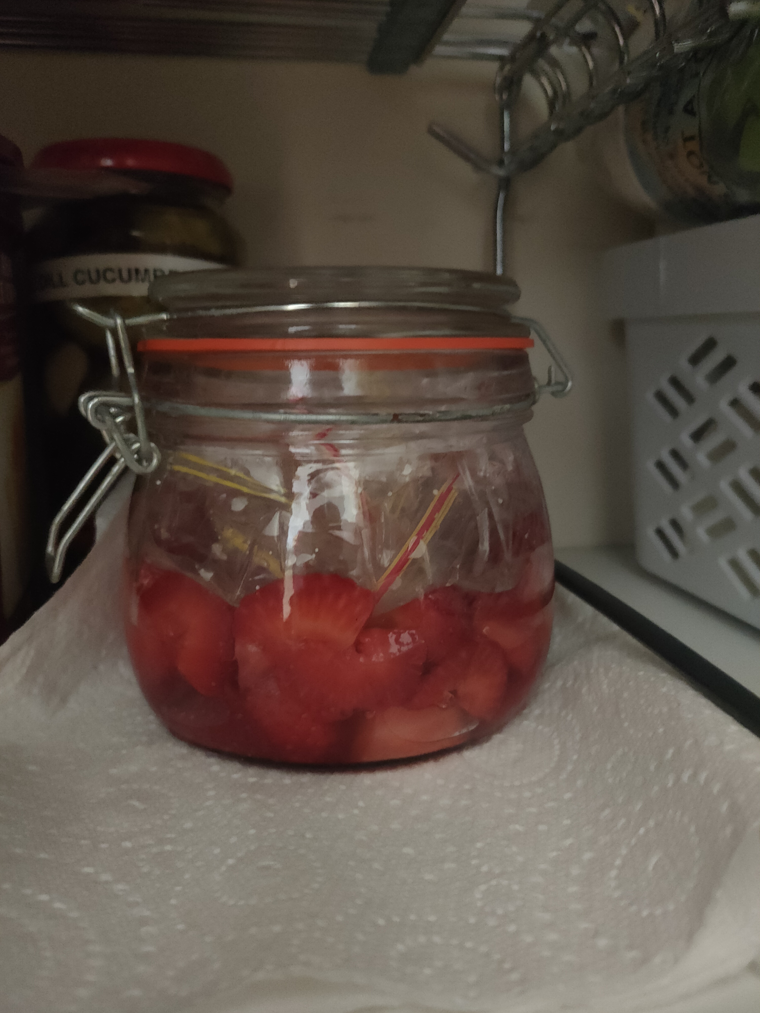 Chopped strawberries in a jar on day 1